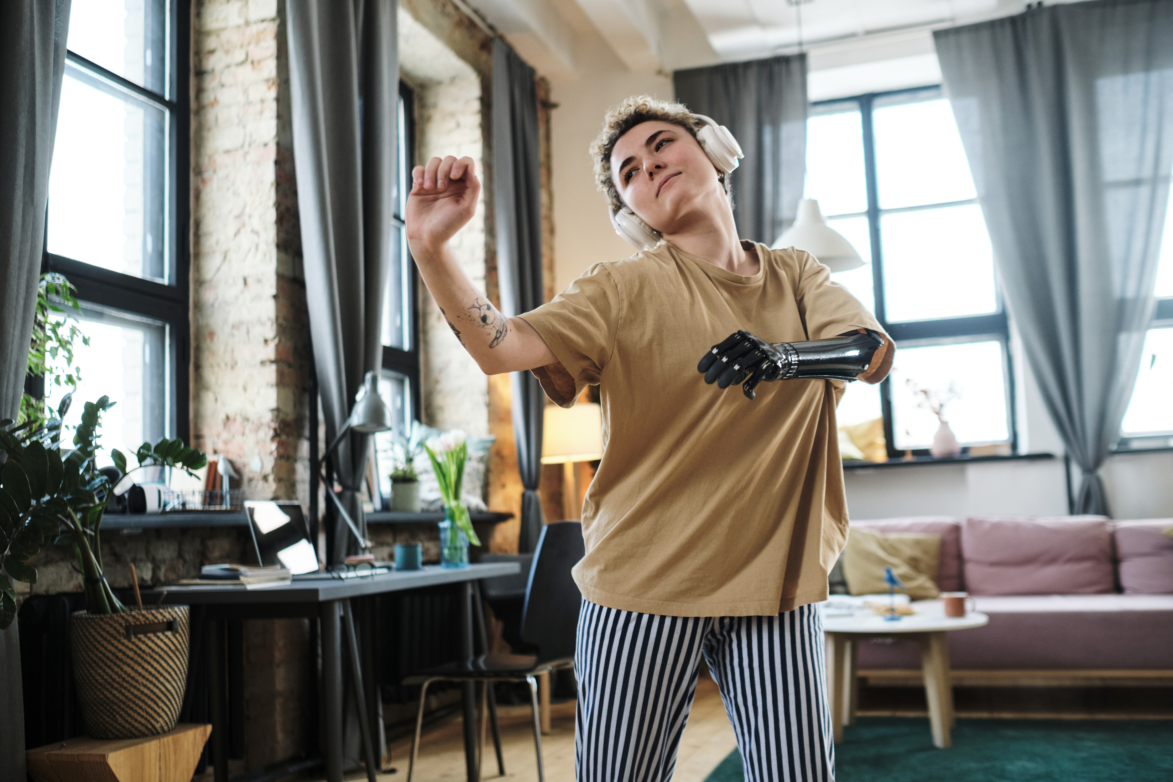 Woman with prosthesis learning to dance