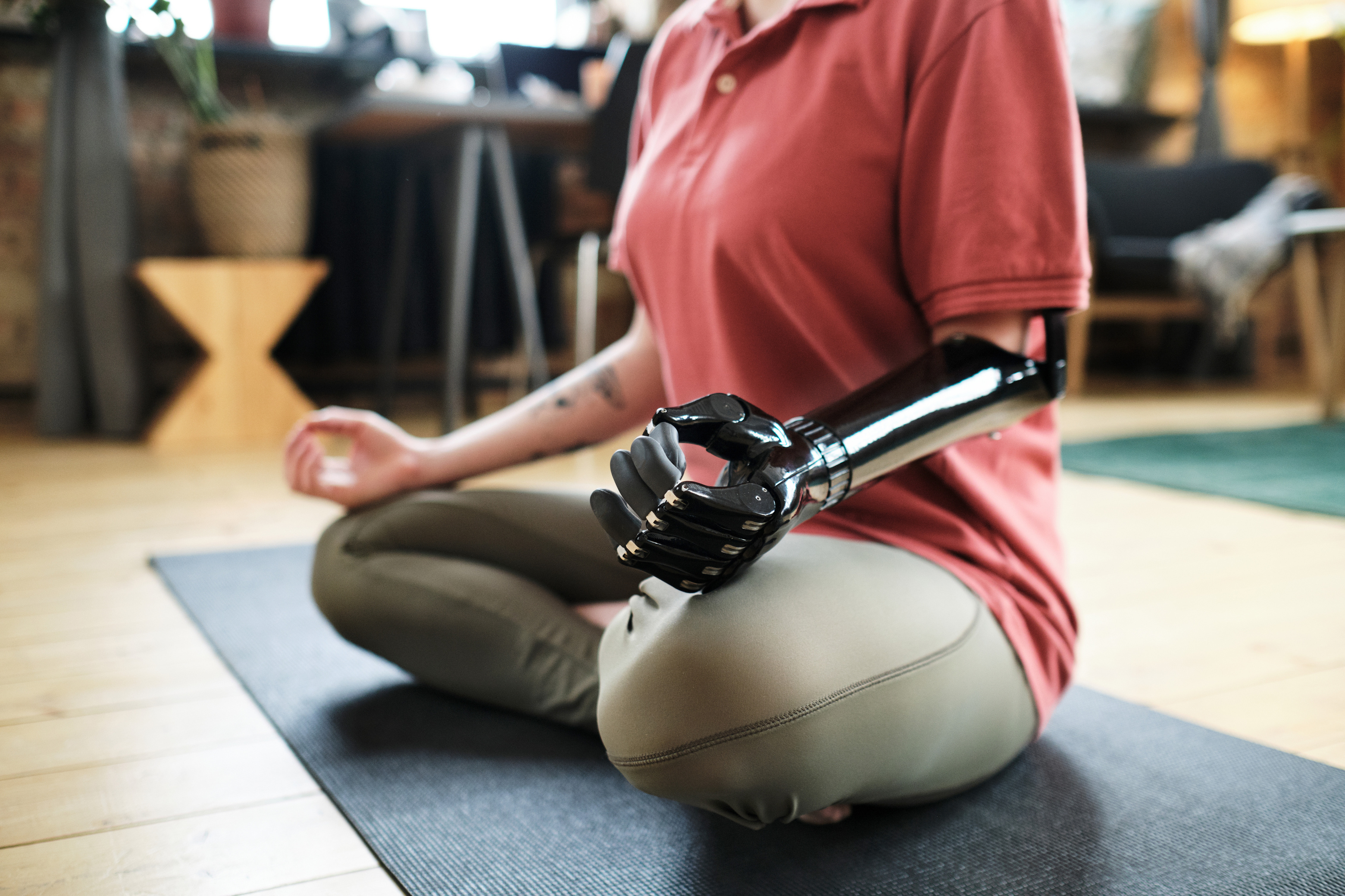 Woman with Prosthetic Arm Meditating